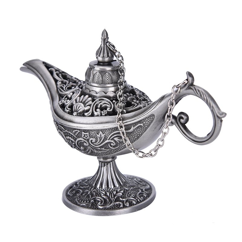 Brûle-encens oriental en métal argenté avec motifs sculptés et chaîne