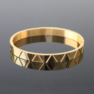 Bracelet manchette doré à motif géométrique